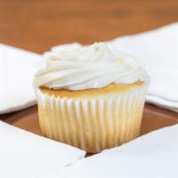 Wedding Cake · Fluellen cupcakes signature flavor. Classic white cake topped with vanilla buttercream frost...