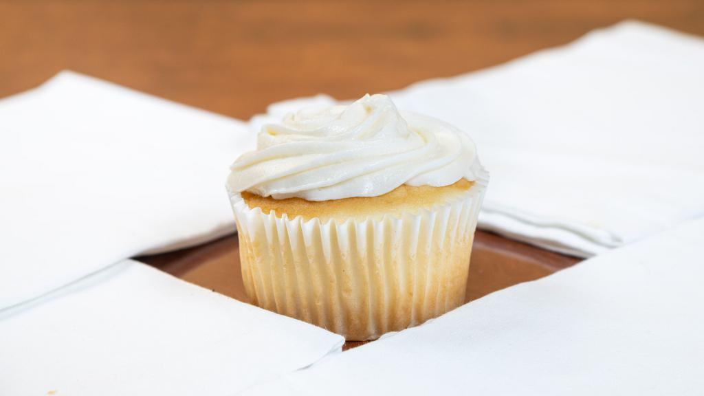 Wedding Cake · Fluellen cupcakes signature flavor. Classic white cake topped with vanilla buttercream frosting.