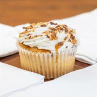 Snicker · Our signature vanilla cake baked with crushed snicker pieces topped with snicker buttercream...