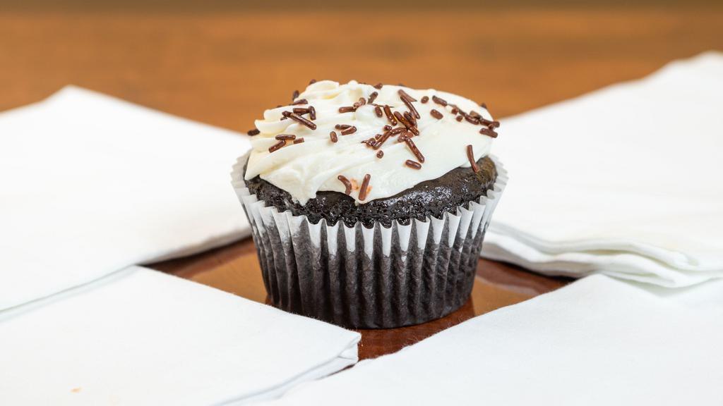 Chocolate Cream Cheese · Our classic chocolate cupcake topped with cream cheese frosting and garnished with chocolate sprinkles.