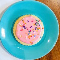 Sugar Cookies · Buttery, golden Sugar Cookies frosted with sprinkles