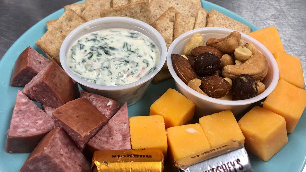 Meat & Cheese Protein Pack · Beef Sticks, Cheese Cubes, Whole Wheat Crackers, Bacon Spinach Dip, & Chocolate