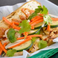 Chicken Banh Mi · Marinated chicken breast, house-made sauce, pickled carrots and daikon, sliced cucumber and ...