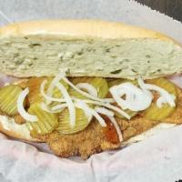 Fish Sandwich · (1) Golden fried catfish fillet - Topped with shredded lettuce, pickles, onions, homemade ta...