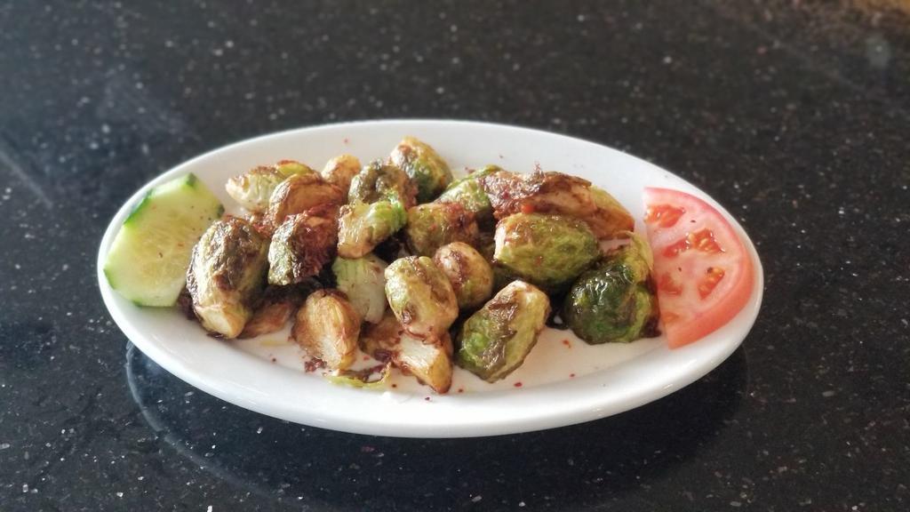 Brussel Sprouts · Gluten free. Fried brussels sprouts, truffle yogurt, and urfa pepper.