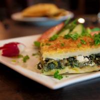 Spinach Pie · Crispy phyllo dough with spinach, onions, and feta cheese. Served with mixed greens.