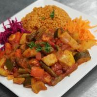 Veggie Guvec · Turkish style ratatouille with bell peppers, celery, carrots, zucchini, onions, garlic, pota...