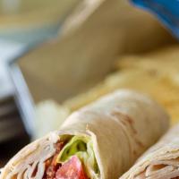 Chicken Bacon Ranch Wrap · Chicken, bacon, spring mix, lettuce. tomatoes. onions, ranch dressing and cheese.
