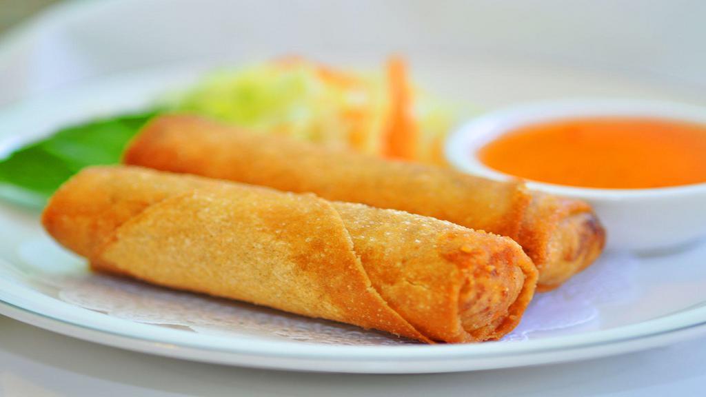 Thai Soft Spring Rolls · Steamed vermicelli, cooked chicken, lettuce, carrot and cucumber wrapped in fresh roll skins, served with sweet and sour sauce and topped with ground peanuts.