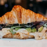 Veggie Sandwich · choice of croissant or bagel with eggs, white cheddar, avocado, mixed greens, sun-dried toma...