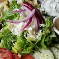 Greek · Vegetarian. Fresh romaine, roma tomatoes, cucumbers, feta, hummus, red onions, artichokes, k...