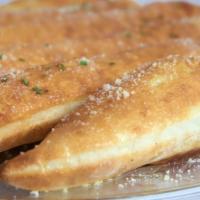 Breadsticks · Homemade breadsticks brushed with garlic sauce and topped with Parmesan cheese. Served with ...