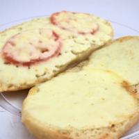 Grilled Cheese Sandwich · Mozzarella and Provolone cheeses with tomatoes. Served on fresh baked focaccia bread with po...