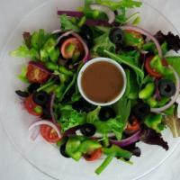 House Salad · Mixed greens, artichokes, tomatoes and red onions with balsamic vinaigrette. Served with gar...