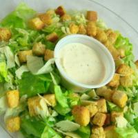 Caesar Salad · Romaine lettuce with creamy caesar dressing, croutons and Parmesan cheese. Served with garli...