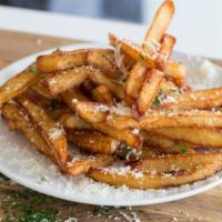 Truffle Fries · Golden crispy french fries with a slight drizzle of truffle oil and a sprinkling of parmesan...