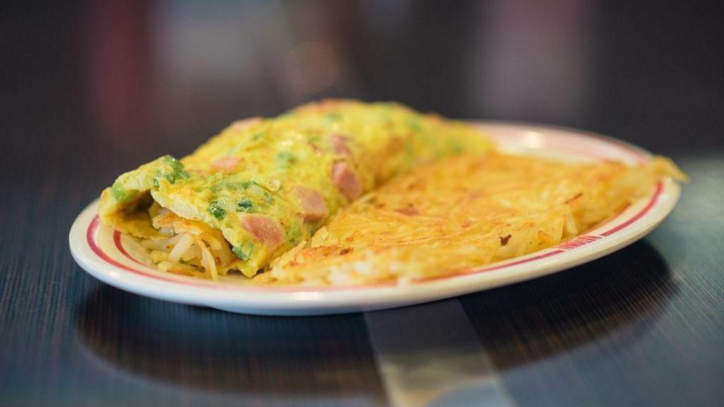 Farmers Omelet · Diced ham, green peppers and onions.  with your choice of American, Swiss, cheddar, feta or pepper-jack cheese. Served with  hashbrowns inside and out, toast & jelly.