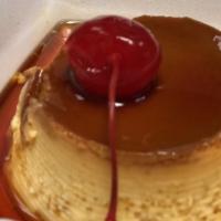 Flan · Homemade light Mexican egg custard with homemade Mexican caramel sauce and whipped cream.