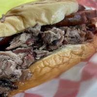 Outlaw Sandwich · Brisket with sausage.