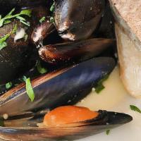 Drunken Mussels · Gorgonzola white wine broth and toasted baguette.