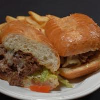 Philly Shaved Steak And Cheese · Grilled shaved rib-eye steak on a sub roll topped with provolone cheese, peppers, onions, le...