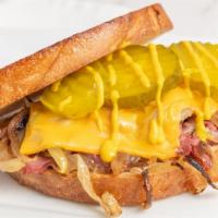 Pastrami Melt · Sourdough, pastrami, grilled onion, cheddar cheese, mustard, pickle