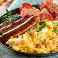 Eggs And Meat Breakfast · Two delicious eggs prepared at your request, bacon or sausage and toast.