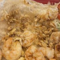 Shrimp & Crab Quesadilla · Flour tortilla grilled and stuffed with cheese, grilled shrimp and crab. Served with Mexican...