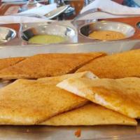 Cheese Dosa · Crispy thin rice pancake spread with cheese.