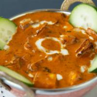 Paneer Butter Masala · Paneer in butter gravy and exotic spices.