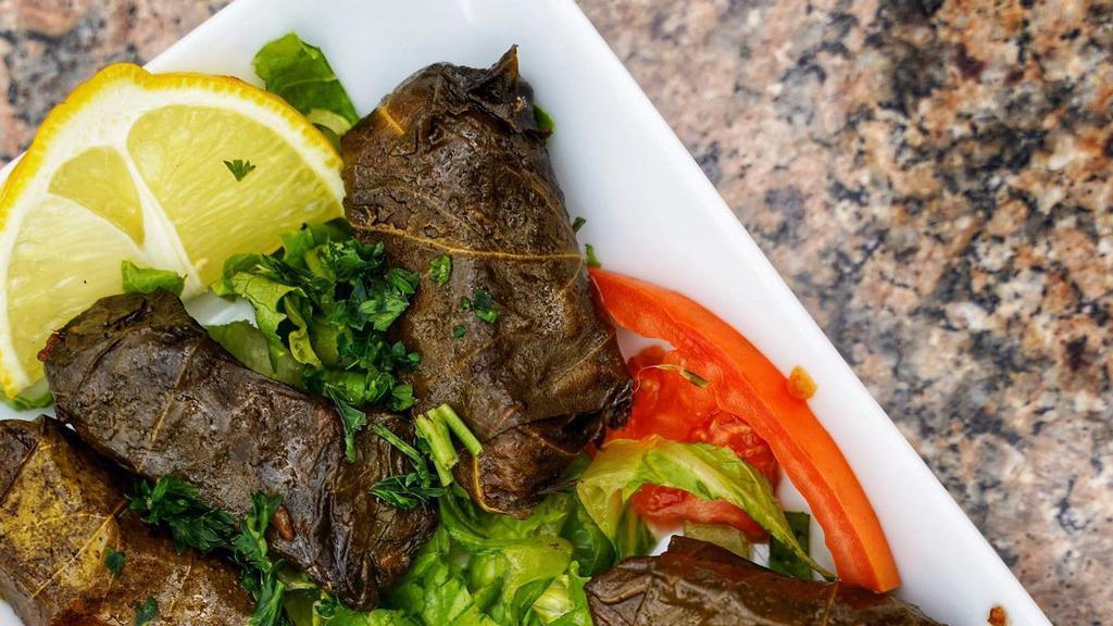 Grape Leaves · Served with four pieces.