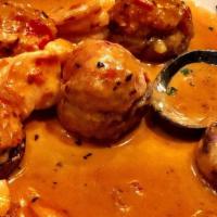 Stuffed Mushrooms · Clam meat stuffed in mushrooms served in our specialty vodka sauce.