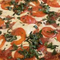 Margarita · Sliced tomatoes, fresh mozzarella and fresh basil. Choice of pizza sauce or extra virgin oli...