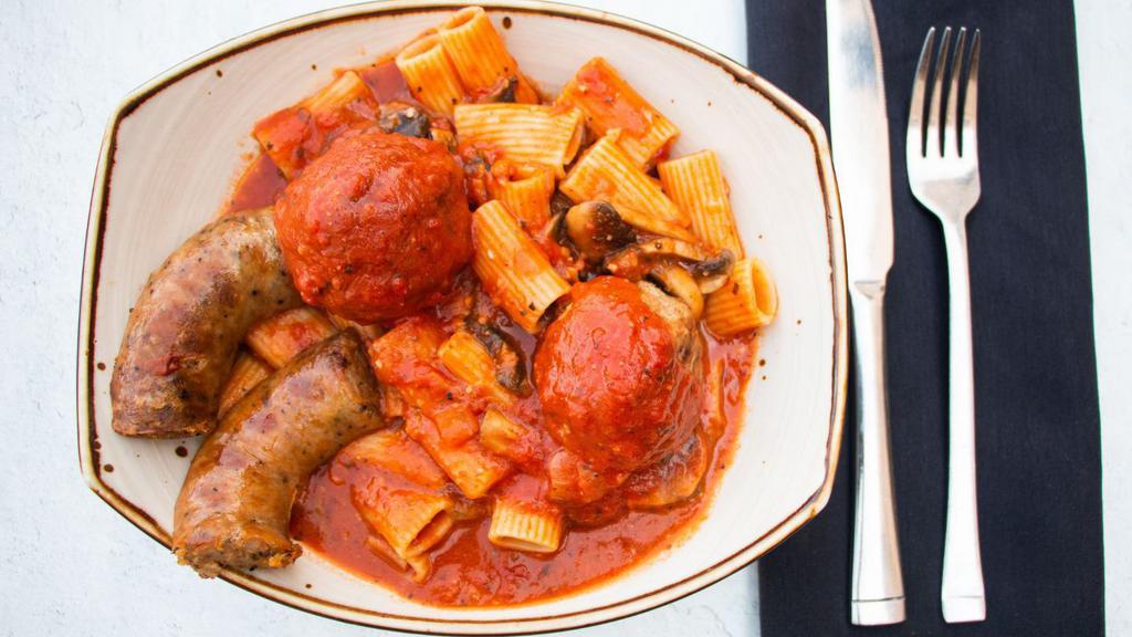 Rigatoni Special · Fresh basil, mushrooms, meatballs and Italian sausage in a spicy marinara sauce.
