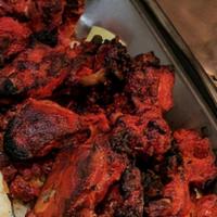 Chicken Kebab & Chicken Tikka · with either naan or rice.