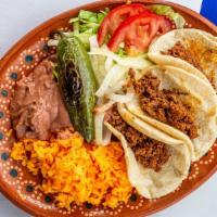 Tacos Plate · Three tacos meat of your choice chicken, asada , chorizo  served with salted onions serrano ...