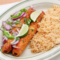 Chicken Seekh Kabob · Ground chicken, mixed vegetable and spices bbq on charcoal grill.