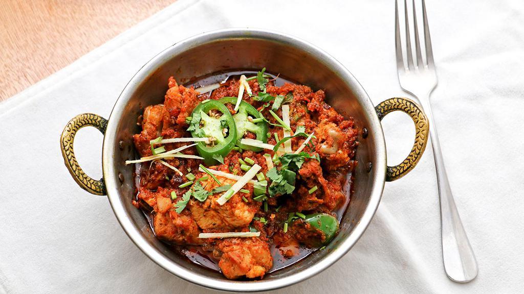 Chicken Karahi · Small pieces of chicken cooked with tomatoes in vegetable oil (for two).