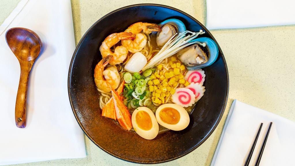 Seafood Noodles · Pork bone broth with Shoyu (soysauce), deep fried Shrimp, Mussels, Scallops, and Kani (Imitation Crab Meat)