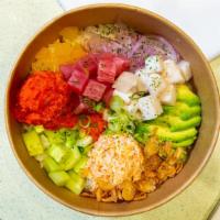 Tuna Lover Bowl · Ahi Tuna, White Tuna, Spicy Tuna, Cucumber, Avocado, Crab salad, Masago, Mango, topped with ...