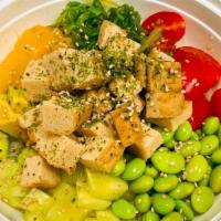 Tofu Bowl (Cooked) · Organic Tofu, Edamame, Cucumber, Avocado, Cherry tomatoes, Seaweed salad, Mango, topped with...