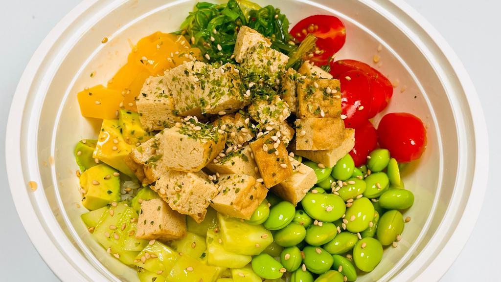Tofu Bowl (Cooked) · Organic Tofu, Edamame, Cucumber, Avocado, Cherry tomatoes, Seaweed salad, Mango, topped with sesame seeds, shredded seaweed and Ponzu sauce