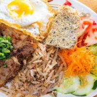 Com Tam Bi Suon Cha Trung / Combination Grilled Pork · *Consuming raw or undercooked meats, poultry, seafood, shellfish, or eggs may increase your ...