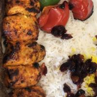 (R2). · A skewer of ground beef & skewer of chicken barg served with grilled tomato, Bell pepper, on...