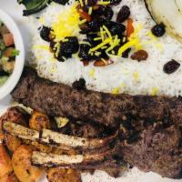 (R4). · A skewer of ground beef, two pieces of chicken tender kabab & two pieces of lamb chop served...