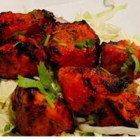 Chicken Tikka · Boneless pieces of tender chicken subtly flavored with our house spices and herbs; roasted o...