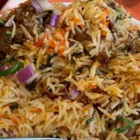 Goat Biryani · Steamed basmati rice dishes cooked with Goat ,a combination of fragrant spices, served with ...
