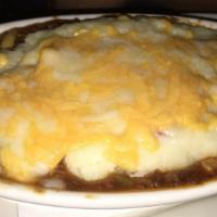 Shepherds Pie · Braised beef and lamb mixed with peas, carrots, corn, and onions topped with mashed potatoes...