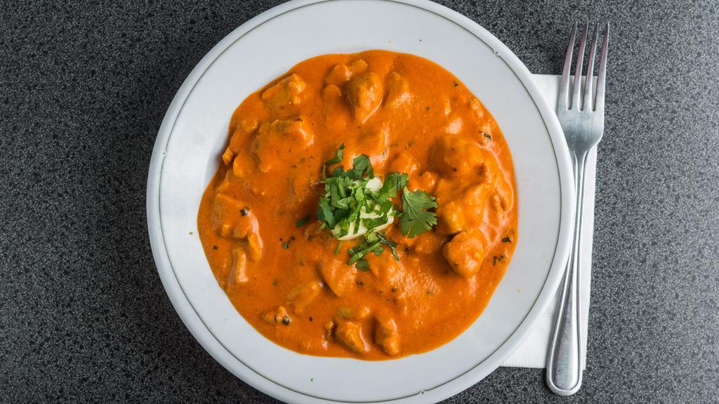 Butter Chicken · Comes with a choice of 1 naan or plain rice.