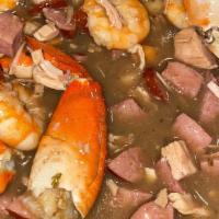 Ace Family Favorite · Seafood gumbo base with chicken, sausage, hot links, shrimp, and crab legs!